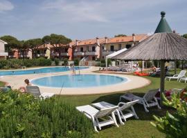 Appartamenti in Residence Portosole e Residence Tamerici con piscina-Cavallino Treporti，位于卡瓦利诺的酒店
