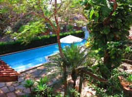 Sossego Homestay，位于沙帕达-杜斯吉马朗伊斯的带泳池的酒店