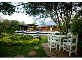 椰青园花园之家度假酒店，位于安帕瓦的度假村