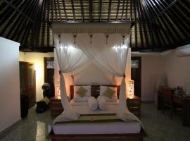 ganesha coral reef resort，位于新加拉惹的酒店