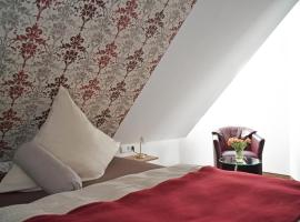 Hotel Zur Eisenbahn，位于雷宁根的酒店