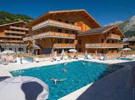Hôtel Prestige Odalys Le Chamois，位于拉克吕萨的带按摩浴缸的酒店