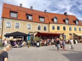 Stora Torget - Visby Lägenhetshotell，位于维斯比的酒店