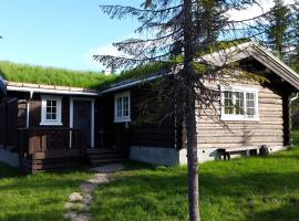 Koselig familiehytte sentralt på Skeikampen til leie，位于Svingvoll的山林小屋