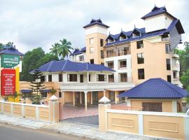 Hotel Green Oasis，位于Thodupuzha的酒店