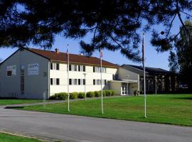 综合酒店，位于赫讷福斯的酒店