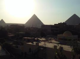 Maged Pyramids View Inn，位于开罗的酒店