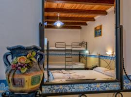 喜欧烈斯一室公寓和公寓酒店，位于蒂锡利维的酒店