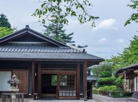 樱泉会馆，位于Izumi奥水间温泉附近的酒店
