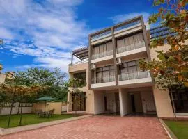StayVista's Greenwoods Villa 1 - City-Center Villa with Private Pool, Terrace, Lift & Carrom Board