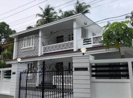 Sannidhi Home stay，位于古鲁瓦尤尔的酒店