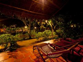 湄公河生态简易别墅度假村，位于丐县的酒店