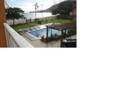 Pé na areia em Boiçucanga condominio Aquamarine - perto de Maresias e Camburi，位于博西坎加的度假屋