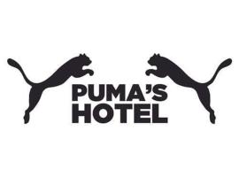 PUMAS HOTEL，位于Tucuma的酒店