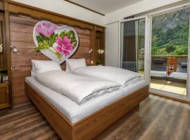 dala Hotel & Apartments，位于洛伊克巴德的酒店