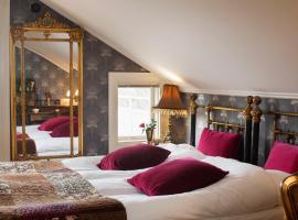 Strandflickornas Havshotell Lysekil，位于吕瑟希尔的酒店