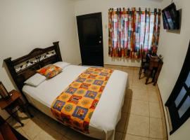 Hotel Tropical Inn Poptún，位于Poptún的酒店