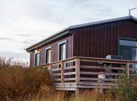 Hestaland Riverside Cottage，位于Staðarhús的酒店