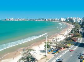 SEGUNDA CASA - Seu cantinho em Guarapari, 1 minuto a pé da Praia do Morro! Suítes confortáveis e modernas - Para casal ou para grupos de até 5 pessoas，位于瓜拉派瑞的酒店