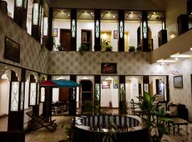 司隶奥卡宫韦弗迪酒店，位于瓦拉纳西的宾馆