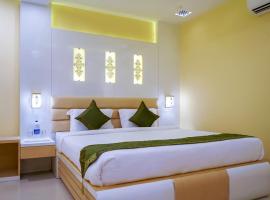 Treebo Trend Oasis Cuttack Puri，位于Biju Patnaik International Airport - BBI附近的酒店