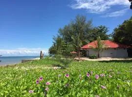 Red Coral Cottage，位于丹绒鲁的海滩短租房
