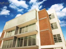 Hotel Y Suites Axolotl，位于奇格纳瓦潘的酒店