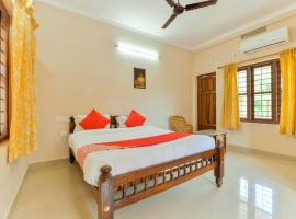 OYO 22767 Holidays Inn Wayanad，位于Pulpally的酒店