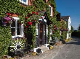 The Golden Lion Inn，位于登比的酒店