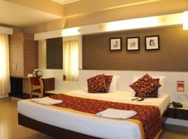 Hotel Pooja International，位于达文盖雷的酒店