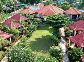 Luxor Resort，位于加桑的带停车场的酒店