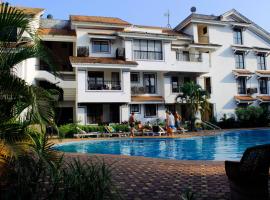 Susegad Suites Goa Apartments & Villas Riviera Hermitage Arpora，位于阿伯来Baga Night Market附近的酒店