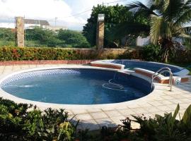 Cabaña Villa Flower Gold，位于Juan de Acosta的酒店