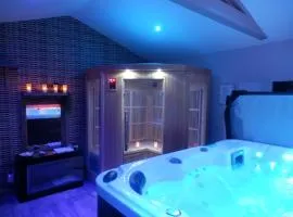 Suite luxe avec sauna et jacuzzi privée
