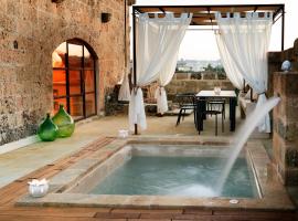 Dimora Sighé, esclusiva villa di design con piscina privata idromassaggio in Puglia，位于阿莱萨诺的度假屋