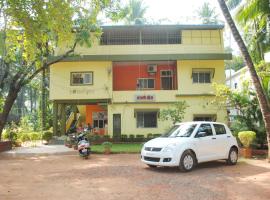 Hotel Anjali Lodge Malvan，位于马尔万的带停车场的酒店