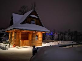 Podhalańska Chatka，位于扎科帕内帕达罗卡滑雪缆车附近的酒店