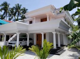 Luxury Villas of Guruvayur，位于古鲁瓦尤尔的酒店