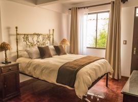 El Jardin De Su Merced B&B，位于苏克雷的酒店