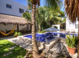 Villa Escondida Guest House Cozumel Downtown，位于科苏梅尔的旅馆