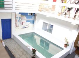 Santorini Lodge，位于拉利伯塔德的酒店