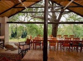 Msunduze River Lodge，位于Mkuze的带停车场的酒店