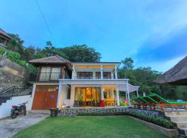 Villa Rinisha Rumah Senja Temukus Lovina，位于罗威那克里斯纳Funtastic Land乐园附近的酒店