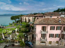 佩斯酒店，位于西尔米奥奈的酒店