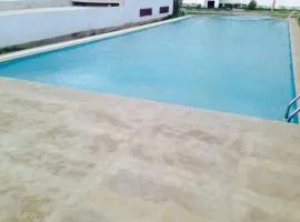 Achakar Hills , Piscine , Vue & Accès à la mer，位于丹吉尔伊本巴特图塔机场 - TNG附近的酒店