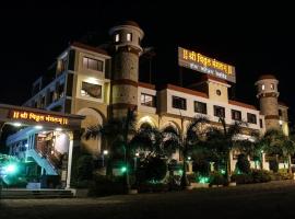 Shri Vitthal Mangalam Satara，位于萨塔拉的酒店