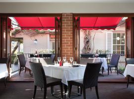 Ramada by Wyndham Brisbane Windsor，位于布里斯班的酒店