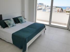 Appartamenti OltreMare，位于加利波利利多岛康基利耶海滩附近的酒店
