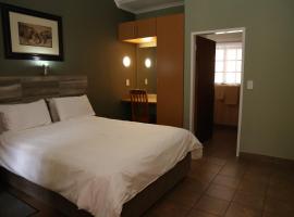 Palm Lodge Rustenburg，位于勒斯滕堡的酒店