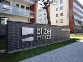 Apartamenty BLIŻEJ MORZA Siłownia i Taras Widokowy Kołobrzeg by Noclegi Renters，位于科沃布热格的酒店